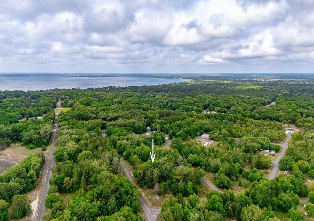 1st image of 15 Magnolia Dr, Ocklawaha, FL 32179 | MLS# TB8536399