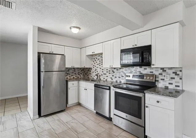4th image of 9608 N 10Th St, Tampa, FL 33612 | MLS# TB8536543