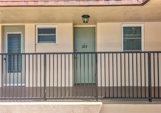 Listing Photo 3 - Condo for sale in building located at 9945 47Th Ave N, St. Petersburg, FL 33708 - Unit #203