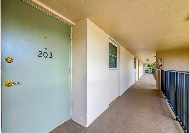 Listing Photo 4 - Condo for sale in building located at 9945 47Th Ave N, St. Petersburg, FL 33708 - Unit #203