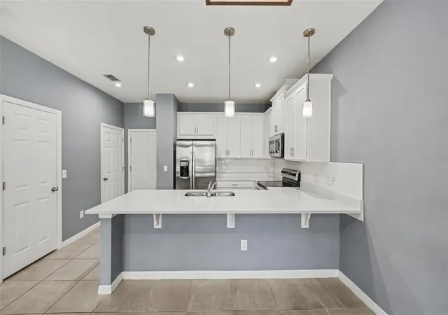 Photo 4 of Townhouse for sale at 1752 Fulfillment Dr, Kissimmee, FL 34744 | MLS# O6431434 | Listing updated on 2026-09-04