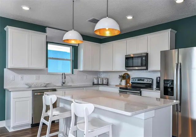 Photo 2 of Single family home for sale at 12817 Blue Reflection Ave, Parrish, FL 34219 | MLS# TB8536615 | Listing updated on 2026-10-17