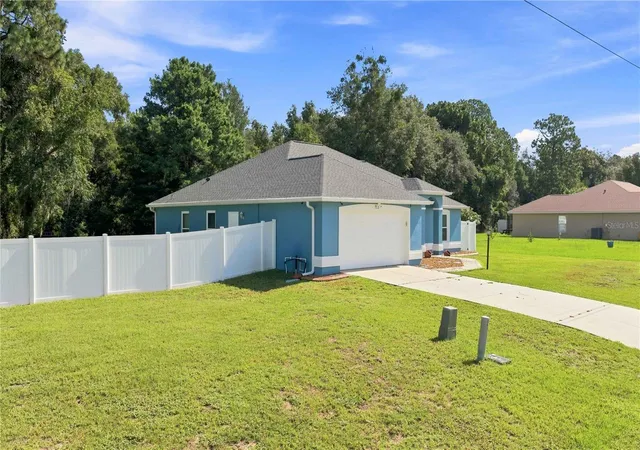 Photo 3 of Single family home for sale at 7411 SW 128th Street, Ocala, FL 34473 | MLS# OM729907 | Listing updated on 2026-08-10