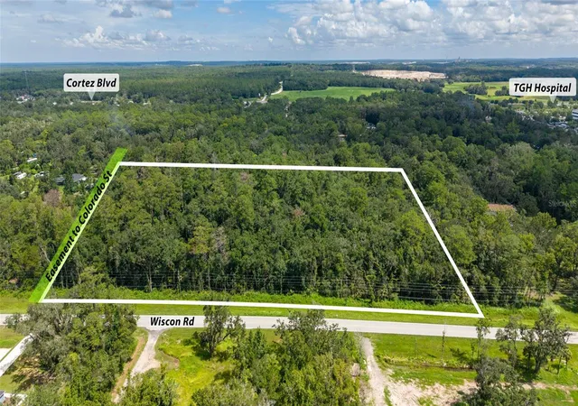 2nd image of 1030 Acres Wiscon Rd, Brooksville, FL 34601 | MLS# W7888355