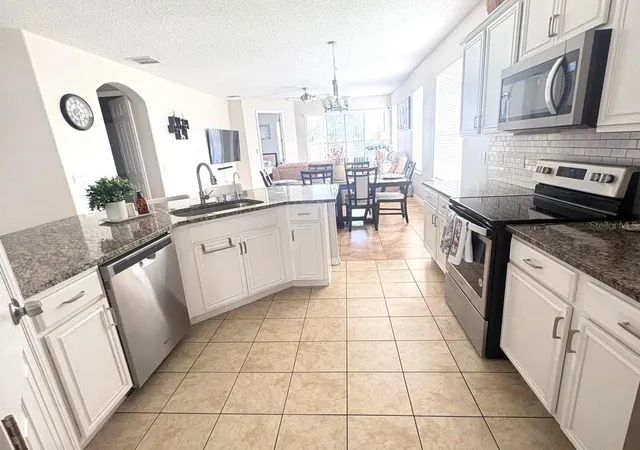 Photo 3 of Single family home for sale at 2248 Stone Lake Ct, Orlando, FL 32824 | MLS# O6431612 | Listing updated on 2026-08-24