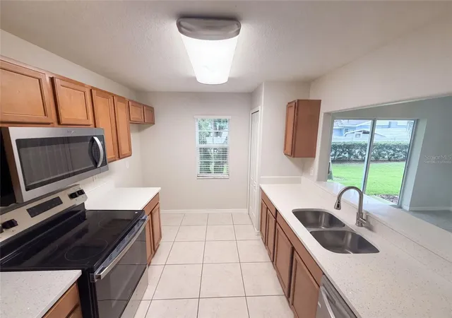 Photo 1 of Townhouse for sale at 37557 Daliha Ter, Zephyrhills, FL 33542 | MLS# O6431637 | Listing updated on 2026-09-21