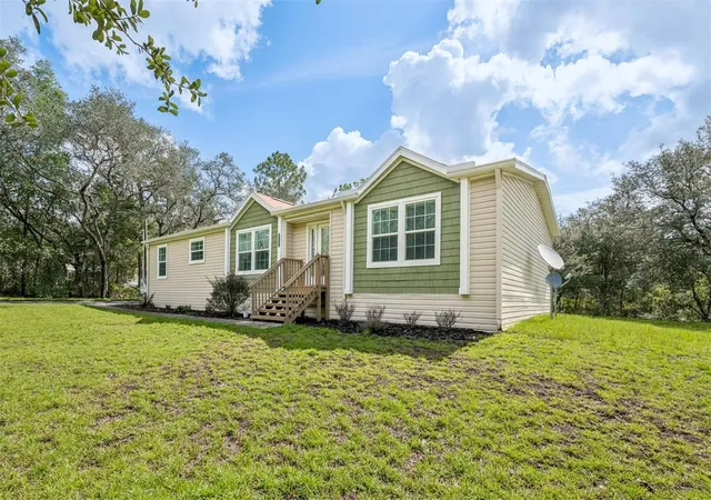 Photo 3 of Manufactured home for sale at 8261 NE 118th Terrace, Bronson, FL 32621 | MLS# GC542554 | Listing updated on 2026-08-29
