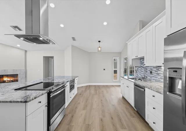 Photo 3 of Single family home for sale at 1302 Henry Ave, Spring Hill, FL 34608 | MLS# TB8536786 | Listing updated on 2026-09-04
