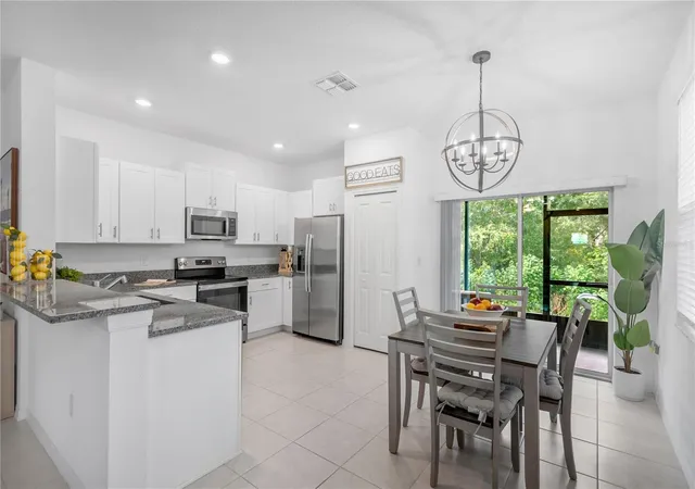 Photo 4 of Townhouse for sale at 6033 Acara Ln, Land O Lakes, FL 34638 | MLS# TB8536793 | Listing updated on 2026-09-23