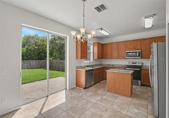Photo 4 of Single family home for sale at 14513 Kaiser Ct, Orlando, FL 32826 | MLS# O6431651 | Listing updated on 2026-08-26