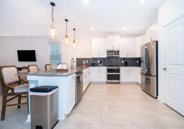 4th image of 9056 Sommerset Hills Dr, Davenport, FL 33896 | MLS# O6431652