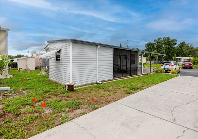 Photo 3 of Manufactured home for sale at 6821 Americana Dr Ne #106, Saint Petersburg, FL 33702 | MLS# TB8536821 | Listing updated on 2026-08-08