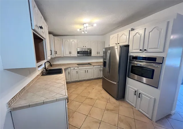 Photo 4 of Single family home for sale at 6610 Bywood Dr, Orlando, FL 32810 | MLS# O6431719 | Listing updated on 2026-10-12