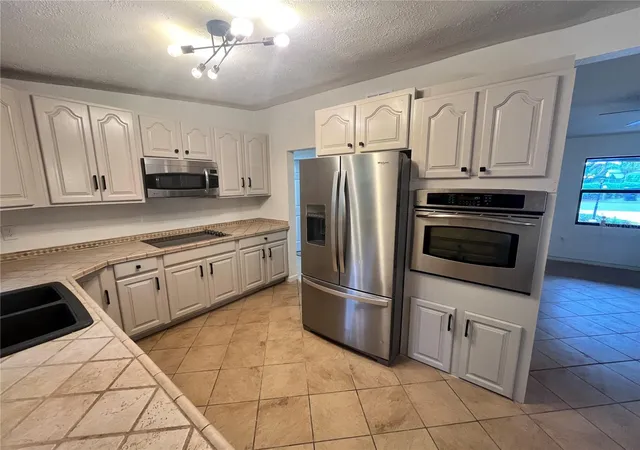 Photo 3 of Single family home for sale at 6610 Bywood Dr, Orlando, FL 32810 | MLS# O6431719 | Listing updated on 2026-09-21