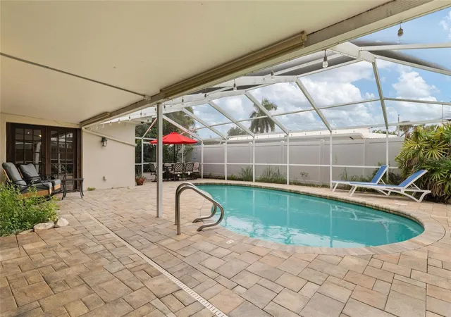 Photo 2 of Single family home for sale at 8404 Flagstone Dr, Tampa, FL 33615 | MLS# TB8536891 | Listing updated on 2026-09-17