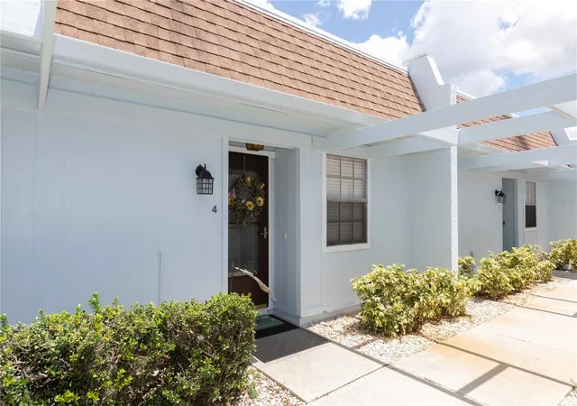 Photo 2 of Condo for sale at 11140 Carriage Hl Dr #4, Port Richey, FL 34668 | MLS# W7888376 | Listing updated on 2026-08-22