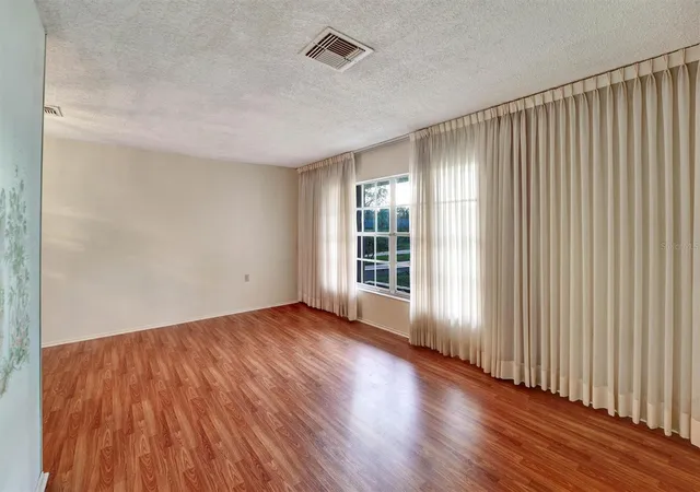 Photo 2 of Single family home for sale at 10550 Calico Loop, Port Richey, FL 34668 | MLS# W7888385 | Listing updated on 2026-08-27