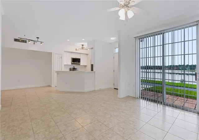 Listing Photo 1 - Condo for sale in building located at 9818 Lake Chase Island Wy, TAMPA, FL 33626 - Unit #9818