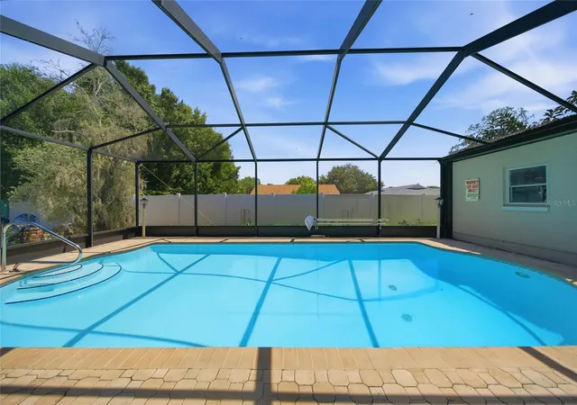 Photo 3 of Single family home for sale at 1403 Garden Ave, Tarpon Springs, FL 34689 | MLS# W7888387 | Listing updated on 2026-10-10