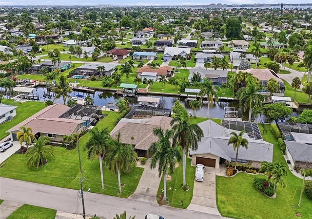 Photo 3 of Single family home for sale at 418 Avalon Dr, Cape Coral, FL 33904 | MLS# TB8536965 | Listing updated on 2026-09-24
