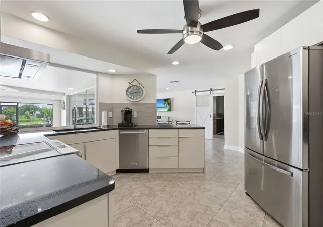 Photo 4 of Single family home for sale at 418 Avalon Dr, Cape Coral, FL 33904 | MLS# TB8536965 | Listing updated on 2026-09-24