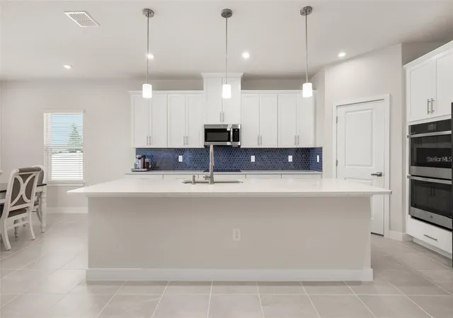 5th image of 11182 Nellie Crossing Cir, Clermont, FL 34711 | MLS# O6431843