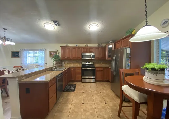 Photo 3 of Single family home for sale at 1420 Windjammer Pl, Valrico, FL 33594 | MLS# TB8537000 | Listing updated on 2026-09-26