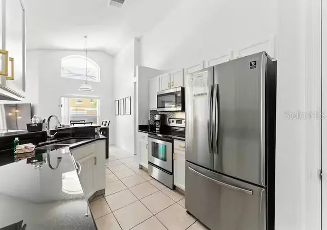 Photo 4 of Single family home for sale at 1017 Lake Berkley Dr, Kissimmee, FL 34746 | MLS# O6431899 | Listing updated on 2026-10-02