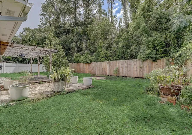 28th image of 8691 Contoura Dr, Orlando, FL 32810 | MLS# O6431970