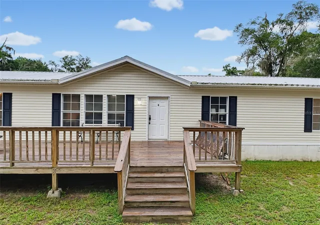 Photo 3 of Manufactured home for sale at 14080 Se 122nd Lane Rd, Ocklawaha, FL 32179 | MLS# W7888405 | Listing updated on 2026-08-09