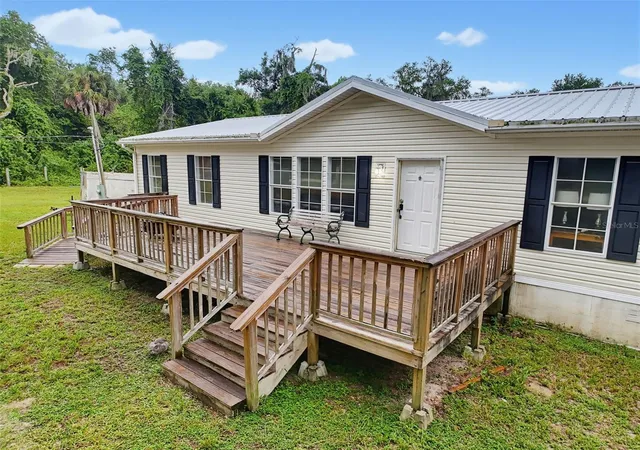 Photo 3 of Manufactured home for sale at 14080 SE 122nd Lane Rd, Ocklawaha, FL 32179 | MLS# W7888405 | Listing updated on 2026-08-09