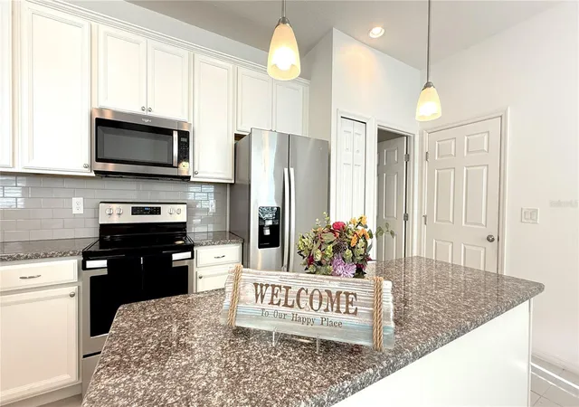 Photo 3 of Townhouse for sale at 2636 Sedge Grass Way, Orlando, FL 32824 | MLS# O6431982 | Listing updated on 2026-08-09