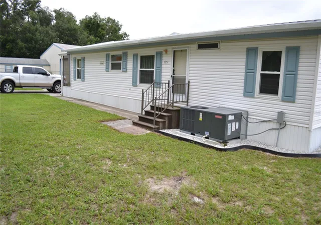 Photo 3 of Manufactured home for sale at 5951 SE 158th Court, Ocklawaha, FL 32179 | MLS# OM730019 | Listing updated on 2026-08-24
