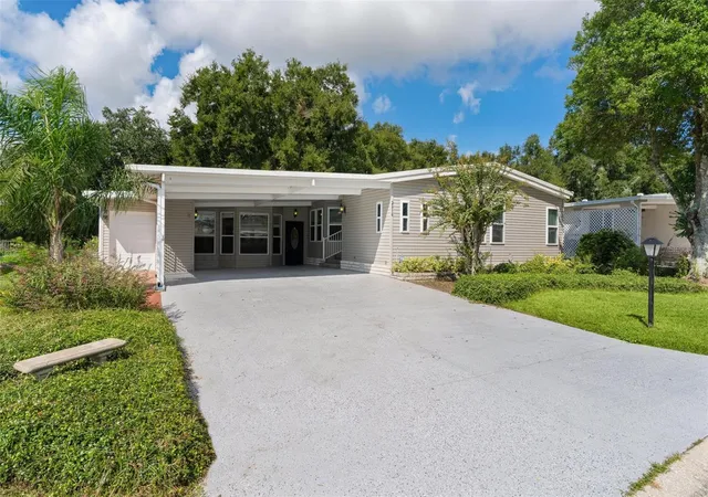 Photo 2 of Manufactured home for sale at 2616 Lake Grassmere Cir #1850, Zellwood, FL 32798 | MLS# O6432038 | Listing updated on 2026-10-06