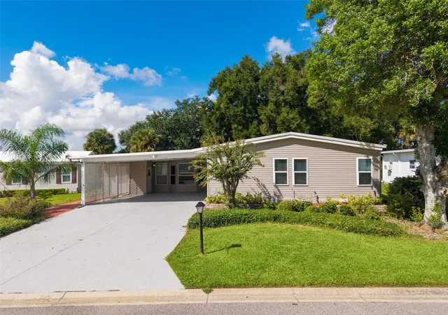 Photo 3 of Manufactured home for sale at 2616 Lake Grassmere Cir #1850, Zellwood, FL 32798 | MLS# O6432038 | Listing updated on 2026-10-06