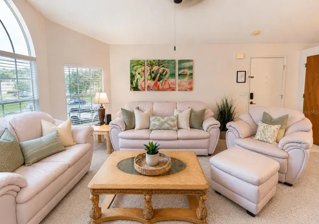 Photo 2 of Condo for sale at 2440 Sweetwater Clb Cir #40, Kissimmee, FL 34746 | MLS# O6432054 | Listing updated on 2026-08-10