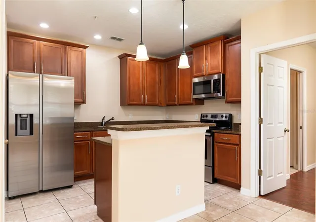 5th image of 9866 Tivoli Villa Dr, Orlando, FL 32829 | MLS# O6432061