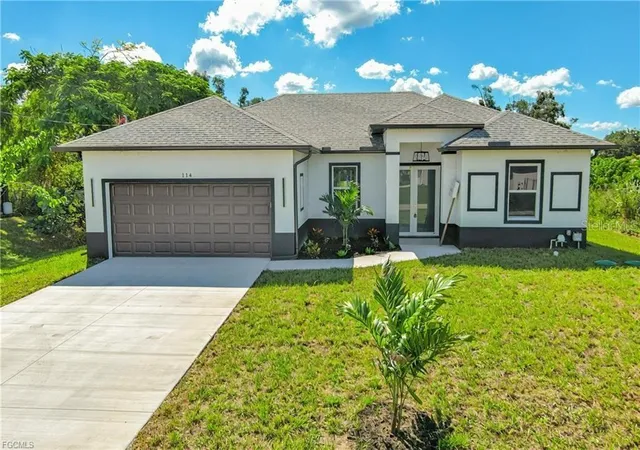 Photo 1 of Single family home for sale at 114 Preston St, Lehigh Acres, FL 33974 | MLS# O6432074 | Listing updated on 2026-09-21
