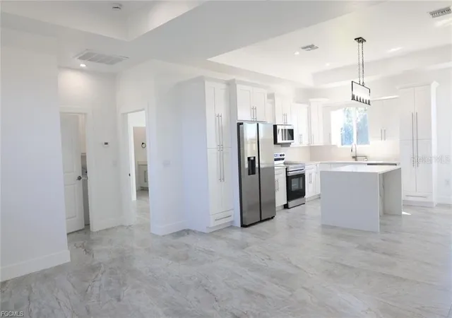 Photo 3 of Single family home for sale at 114 Preston St, Lehigh Acres, FL 33974 | MLS# O6432074 | Listing updated on 2026-09-21
