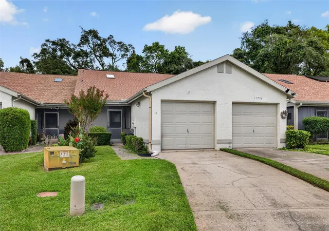 Photo 1 of Single family home for sale at 11754 Spring Tree Ln, Port Richey, FL 34668 | MLS# TB8537243 | Listing updated on 2026-08-10
