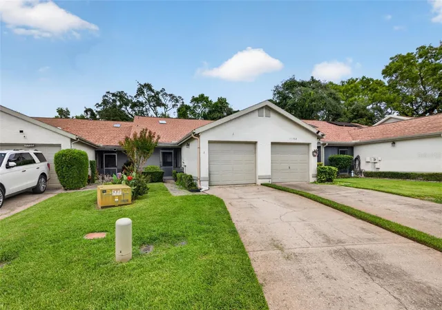 Photo 3 of Single family home for sale at 11754 Spring Tree Ln, Port Richey, FL 34668 | MLS# TB8537243 | Listing updated on 2026-08-10