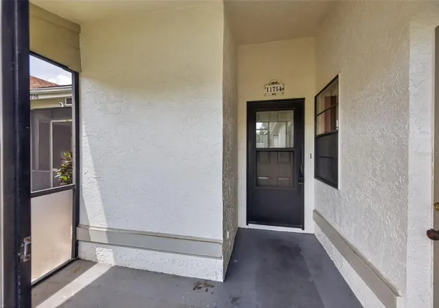 Photo 3 of House for sale at 11754 Spring Tree Ln, Port Richey, FL 34668 | MLS# TB8537243 | Listing updated on 2026-08-10