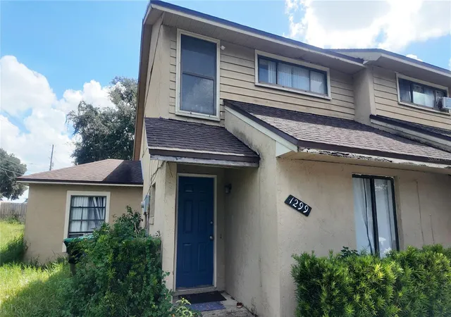 Photo 1 of Townhouse for sale at 1299 Woodman Wy #1, Orlando, FL 32818 | MLS# O6432088 | Listing updated on 2026-10-05