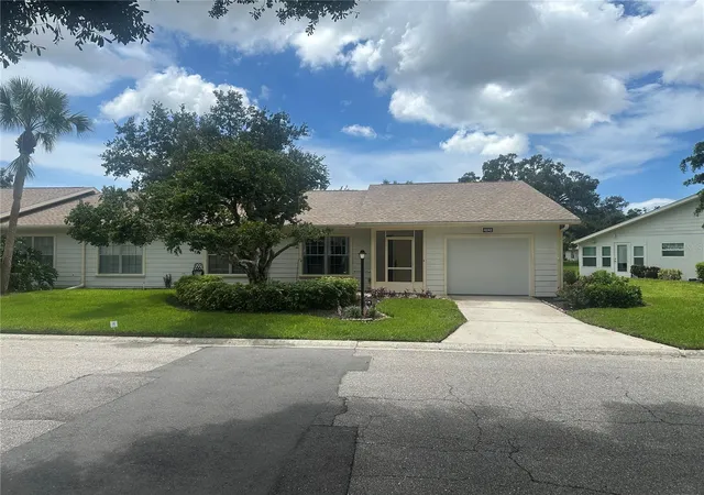 Photo 1 of Single family home for sale at 4242 Oakhurst Cir E, Sarasota, FL 34233 | MLS# A4702505 | Listing updated on 2026-10-07