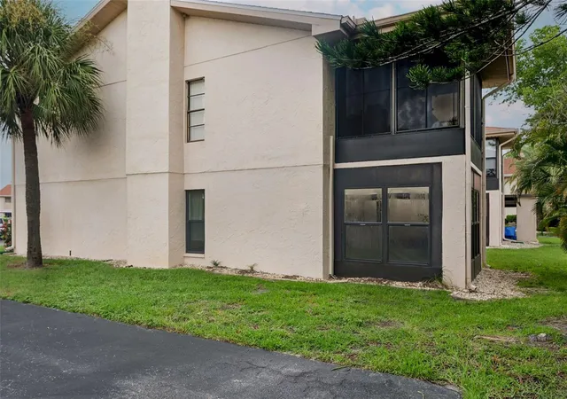 Listing Photo 2 - Condo for sale in building located at 9920 Eagles Pt Cir, Port Richey, FL 34668 - Unit #2