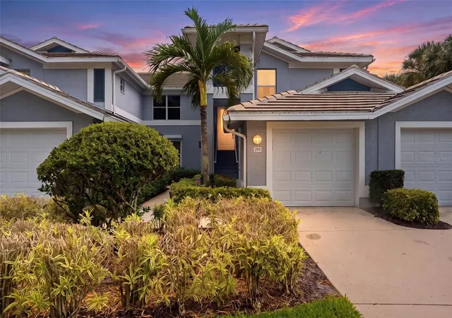 Listing Photo 1 - Condo for sale in building located at 710 Tarpon Cvs Dr, Naples, FL 34110 - Unit #203