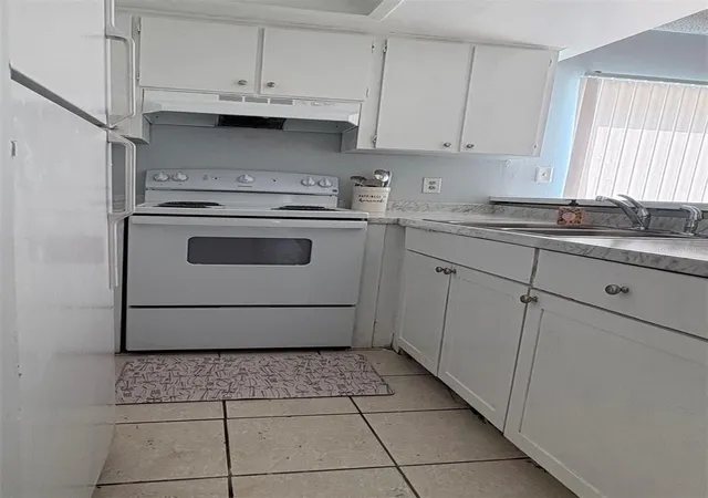 Photo 3 of Sale Pending at 13045 Londondary Pl, Tampa, FL 33612 | MLS# TB8537396 | Listing updated on 2026-09-29