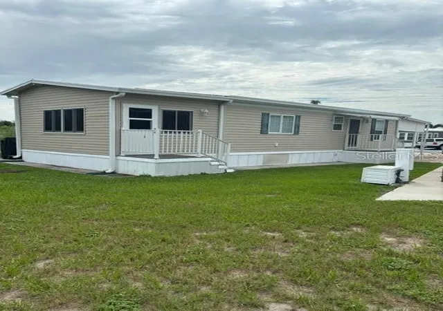 Photo 3 of Manufactured home for sale at 9000 US Hwy 192 #56, Clermont, FL 34714 | MLS# S5155339 | Listing updated on 2026-08-11