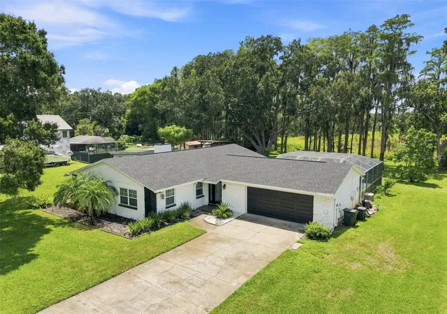 Photo 1 of Single family home for sale at 210 Lake Hobbs Rd, Lutz, FL 33548 | MLS# TB8537426 | Listing updated on 2026-10-03