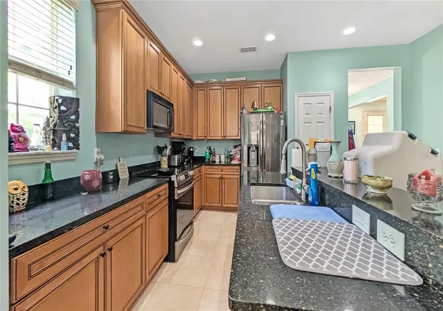 Photo 3 of Single family home for sale at 1114 Tapestry Dr, Kissimmee, FL 34747 | MLS# O6432237 | Listing updated on 2026-09-28